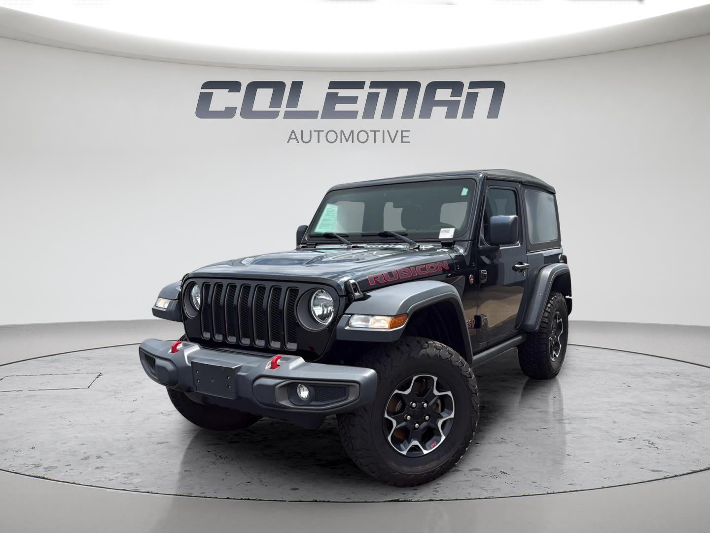2020 Jeep Wrangler Rubicon in Black Clearcoat — front three-quarter view