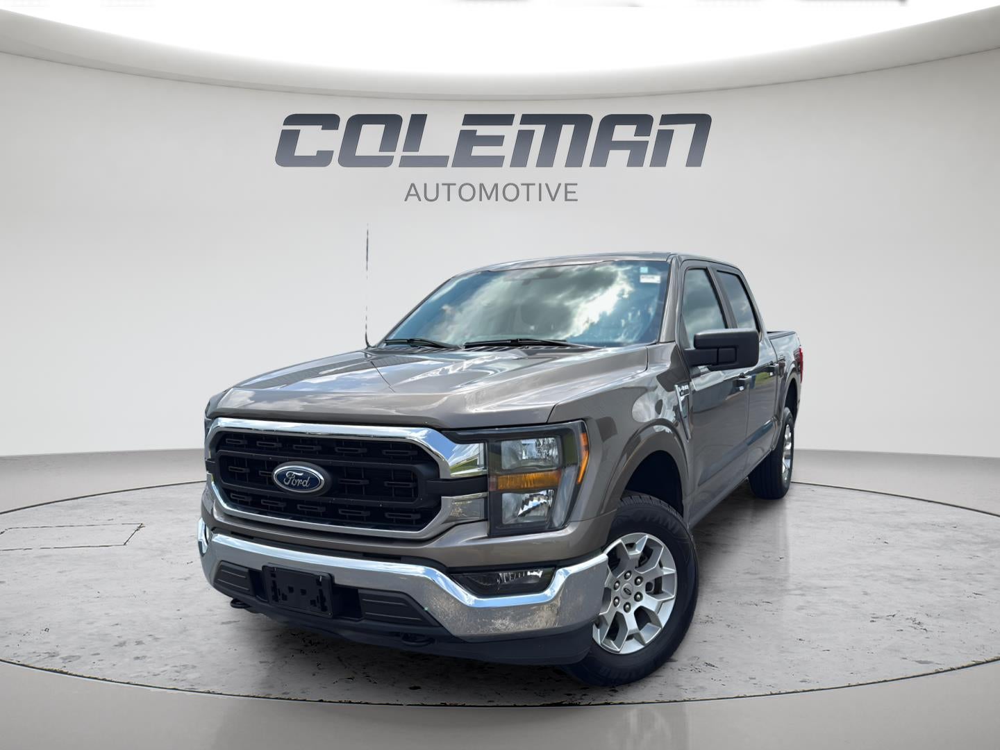 2023 Ford F-150 XLT in Agate Black — front three-quarter view