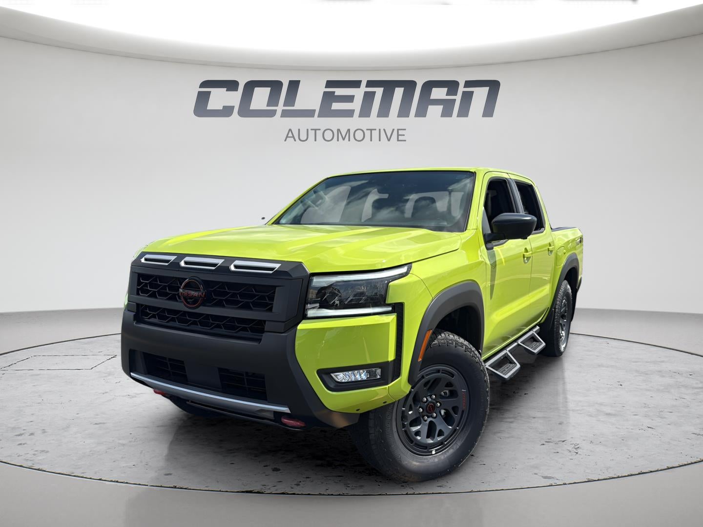 2026 Nissan Frontier Crew Cab PRO-4X in Citrus Strike — front three-quarter view