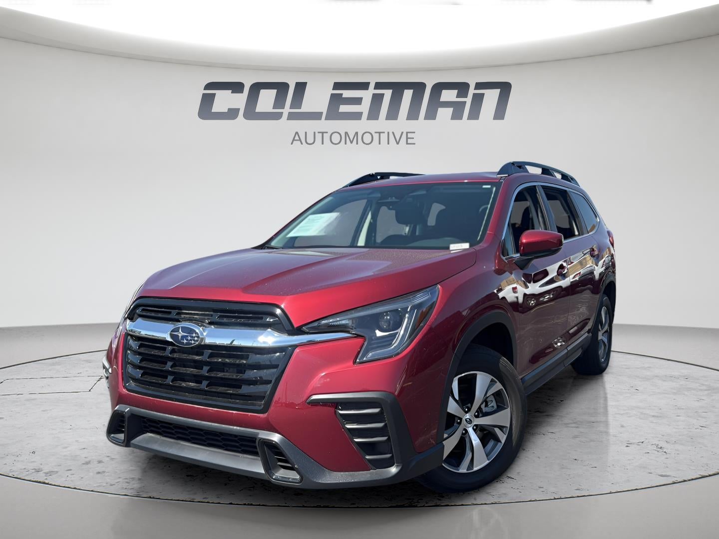 2025 Subaru Ascent Premium in Crimson Red Pearl — front three-quarter view