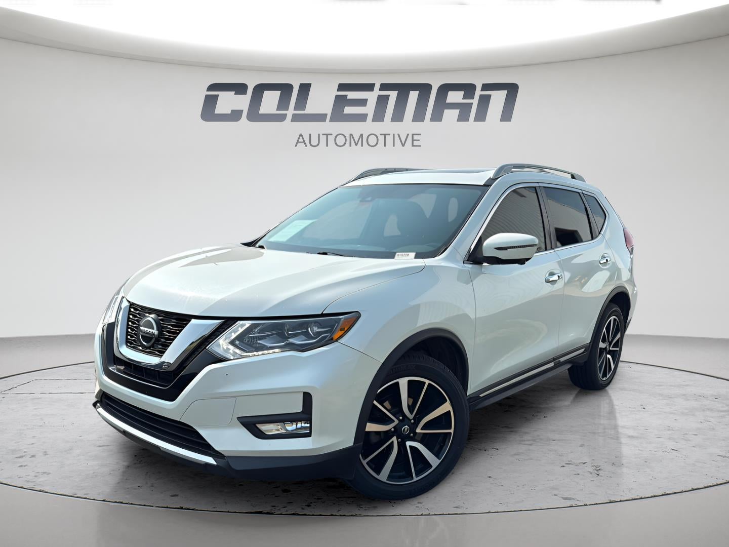 2018 Nissan Rogue SL in Pearl White — front three-quarter view