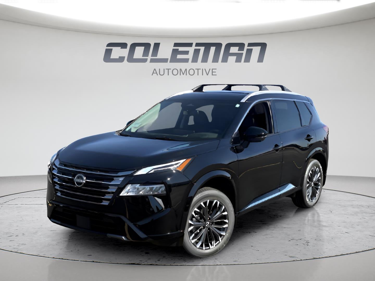 2026 Nissan Rogue Dark Armor in Super Black — front three-quarter view